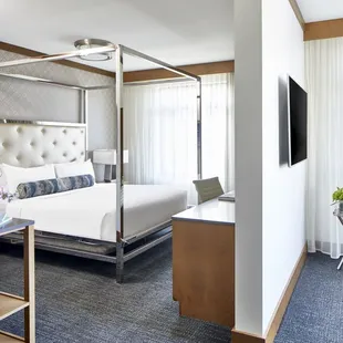 Our Junior Suite includes a separate sitting area and work desk, as well as a plush king-size deluxe pillowtop bed.