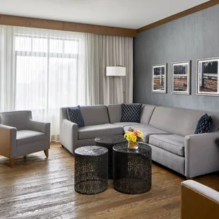 At an expansive 750 square feet, our luxury suite includes a separate living room and dining area with wet bar.