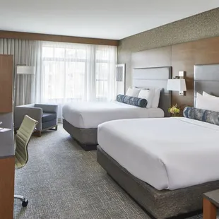 Our spacious Premier Rooms rooms feature either one King or two Queen deluxe pillowtop beds, complimentary WiFi, a 55'' HD TV, and more.