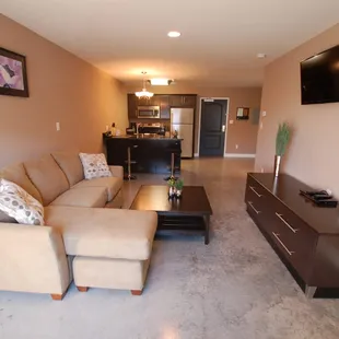 Living room and kitchen view.  The Hotel Sync has ZERO carpeting!