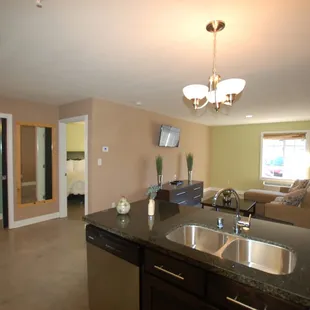 A view from the kitchen to the rest of the room.  All rooms are suites.