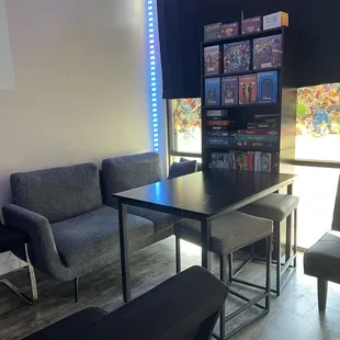Board/card game area. Rent the table to play some of the games we have in our selection or bring in your own.
