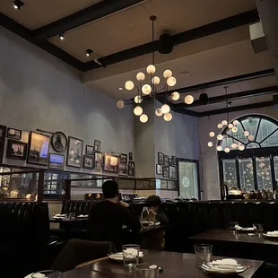 a dining room with a chandelier