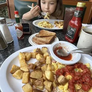 #7 ham egg and cheese scramble with country potatoes.