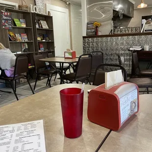 a table with a napkin dispenser on it