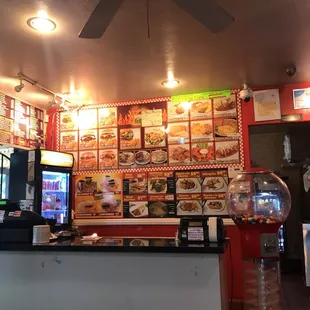 The front counter area with menu in the background