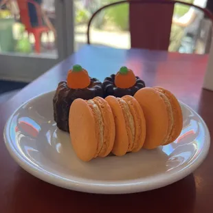 Pumpkin spice canelés and pumpkin macarons