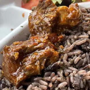 The oxtails. The rice. The fresh salad on the side. Perfection.