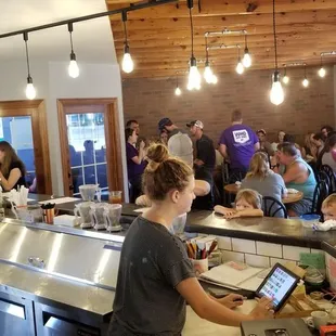 a group of people in a restaurant