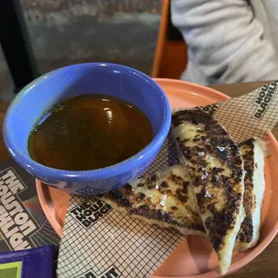 Roti with a curry tomato soup