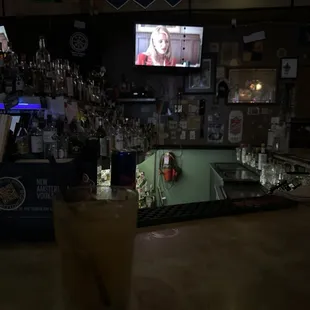 Main liquor / bar / registers &amp; TV wall.