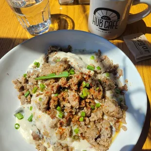 The Hub Skillet with eggs and The Hub Biscuits with Mushroom Gravy plus sausage.
