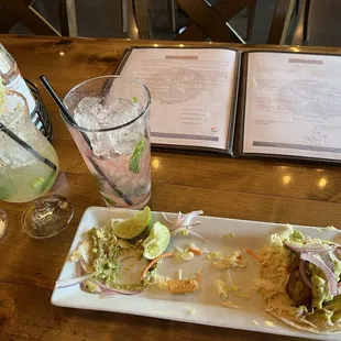 Pork belly taco (you get 3 lol). Watermelon Mint Lemonade and Spicy Margarita.