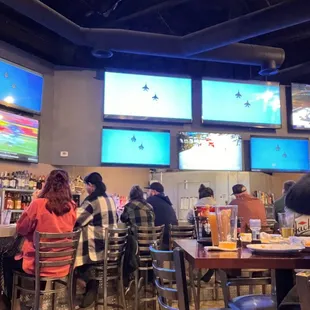Bar area with lots of TVs