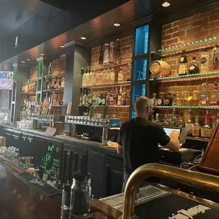 a man working at a bar