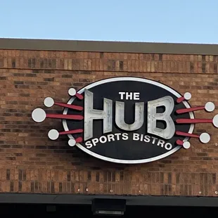 a sign for the hub sports bistro