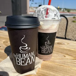 two cups of coffee on a table