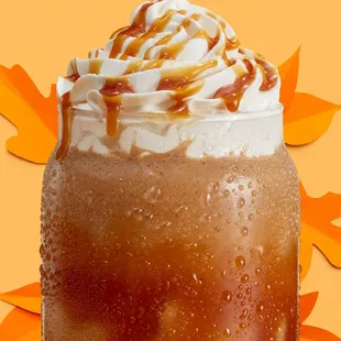 a drink with whipped cream and caramel