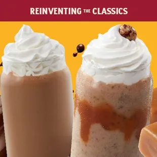 two milkshakes with whipped cream and chocolate