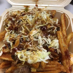 Carolina fries - fries, slaw, pulled pork, and pimento cheese.