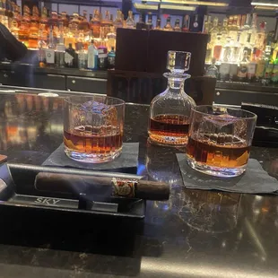 Old Fashion with rum for 2, served in a decanter.