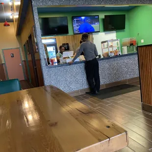 Counter and hallway to restaurant.