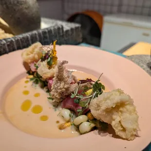 Crispy ceviche, calamari, yellow trail, choclo cancha corn, rocoto tiger milk