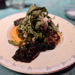 8 oz ribeye steak, arugula, fennel, honey mustard, and ahi hummus