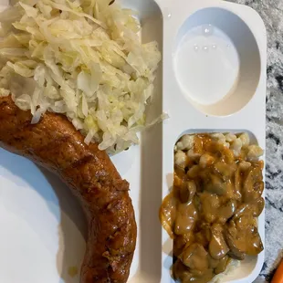 Spicy sausage and kraut from the Hungarian Butcher, and my homemade spaetzle and mushroom gravy.     Don&apos;t make fun of my kids plate LOL
