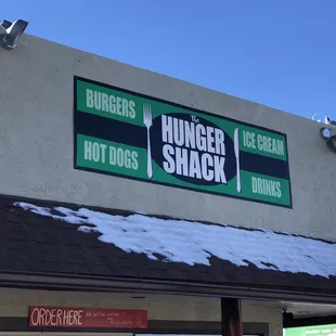 a sign on the side of a building