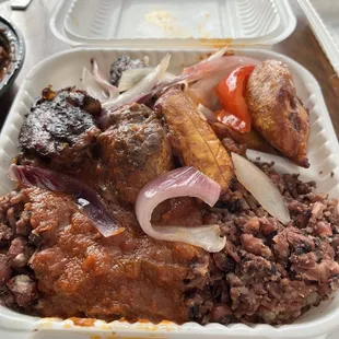 a plate of meat and vegetables