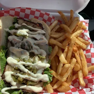 Mesquite smoked Turkey breast sandwich + provolone + hatch green chile on brioche.  Very very tasty.  Fries were good too.