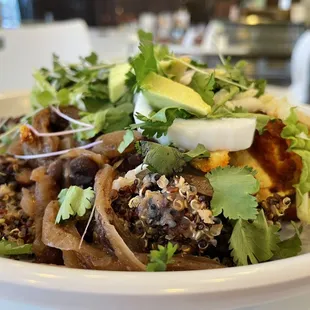 Pulled Banana Peels/Pimento Cheese/Quinoa/Stewed Beans/Masa Shell/Chipolte Tomato Sauce/Sprouted Quinoa/Shredded cabbage &amp; Avocado.