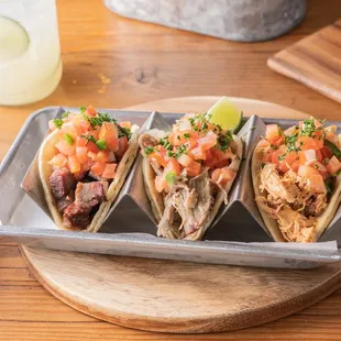 Street Tacos. Tri-Tip, Pulled Pork, Pulled Chicken. Topped off with Pico de Gallo.