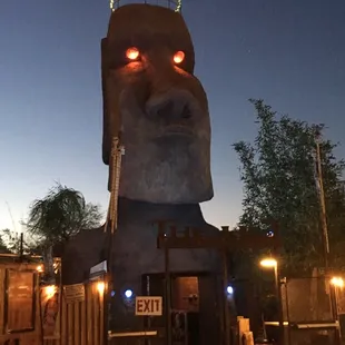 a statue of a man with glowing eyes