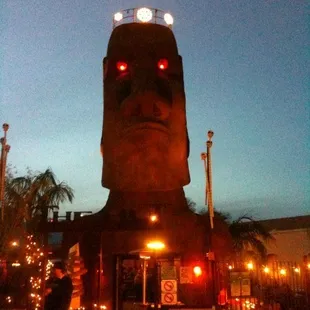 a statue of a man with glowing eyes