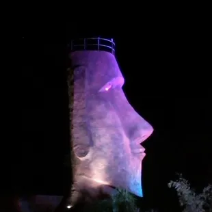 The giant Tiki Head from Magic Carpet Golf is finally back up at The Hut.