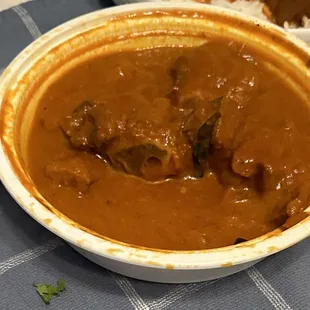GOAT CURRY.. it was ok but we ordered medium and it was extremely spicy. Also didn&apos;t have much depth to it
