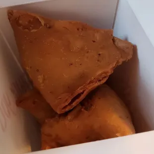 Vegetable samosa ($7 for three), vegan by default. Tasty and nicely done.