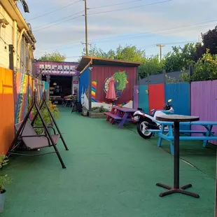 Awesome place to sit outside and eat, talk to friends or just enjoy the colorful surroundings.