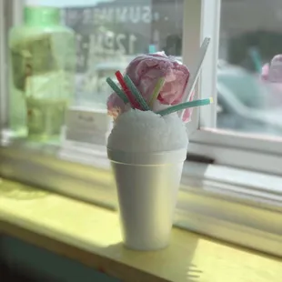 pina colada topped with real cotton candy + sour straws
