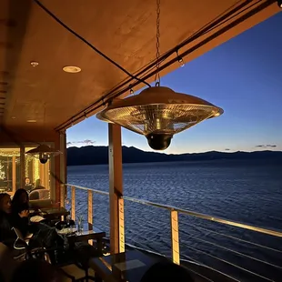 Balcony overlooking South Lake Tahoe with heat lamps