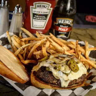 a cheeseburger with fries and ketchup