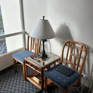 Small seating area in one bedroom Palm Suite.