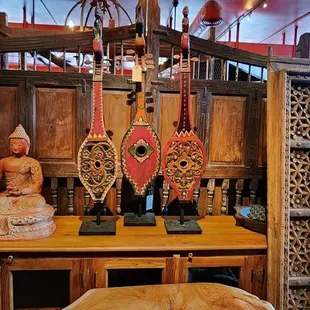 a table with a buddha statue