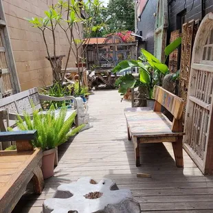 a wooden bench and a tree stump