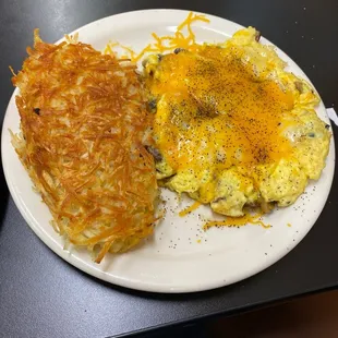 Has browns and scrambled eggs with cheese and mushrooms