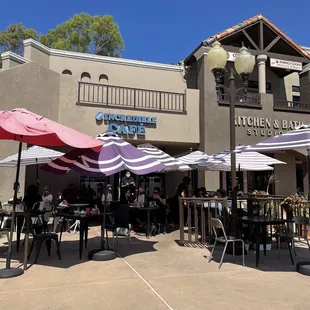 Outdoor dining. Side entrance. Main entrance to the left around the corner.