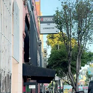 Front of the venue, in line