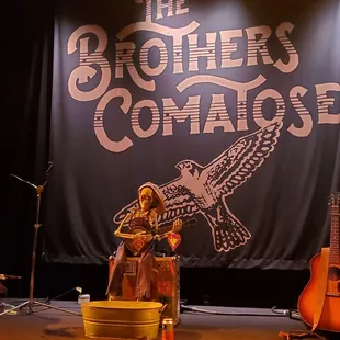 a stage with guitars and a guitar